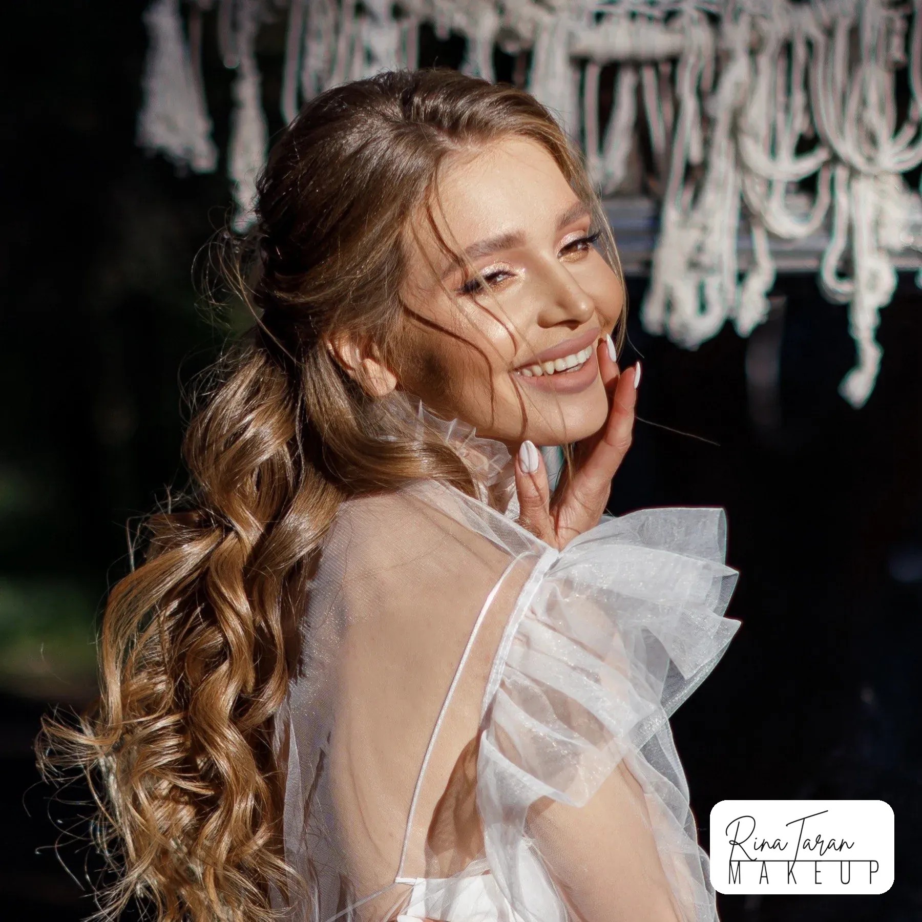 Barely-there wedding makeup with glowing skin and a soft peach lip