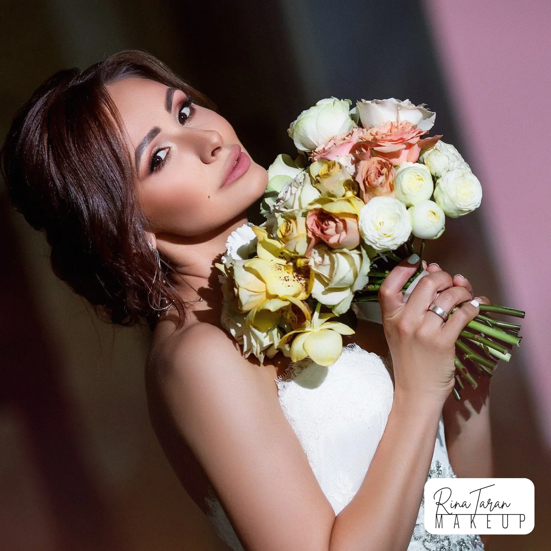 Warm neutral eye and a soft rose lip on a brunette bride