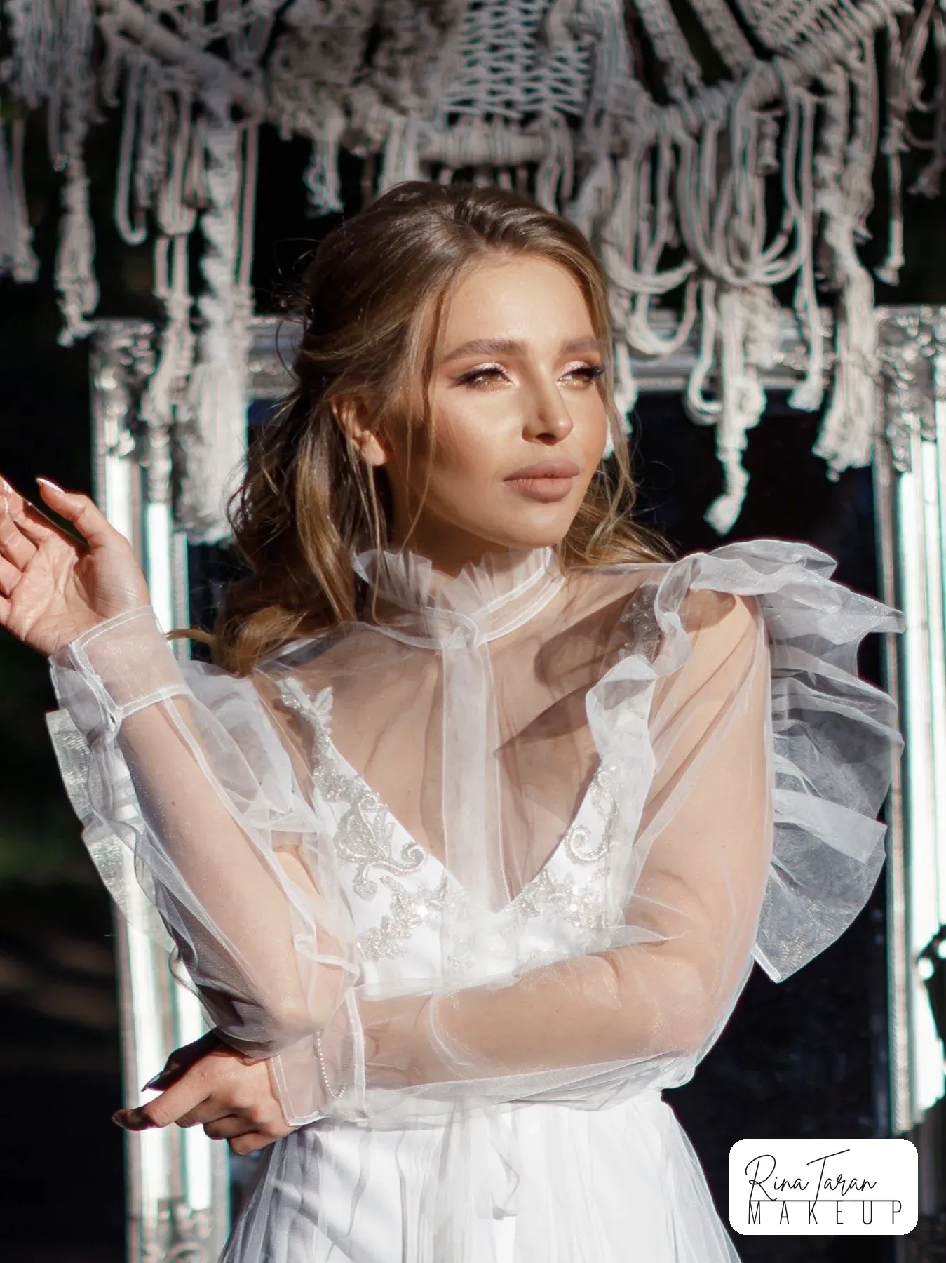 Light, natural wedding makeup with a dewy finish and a nude lip
