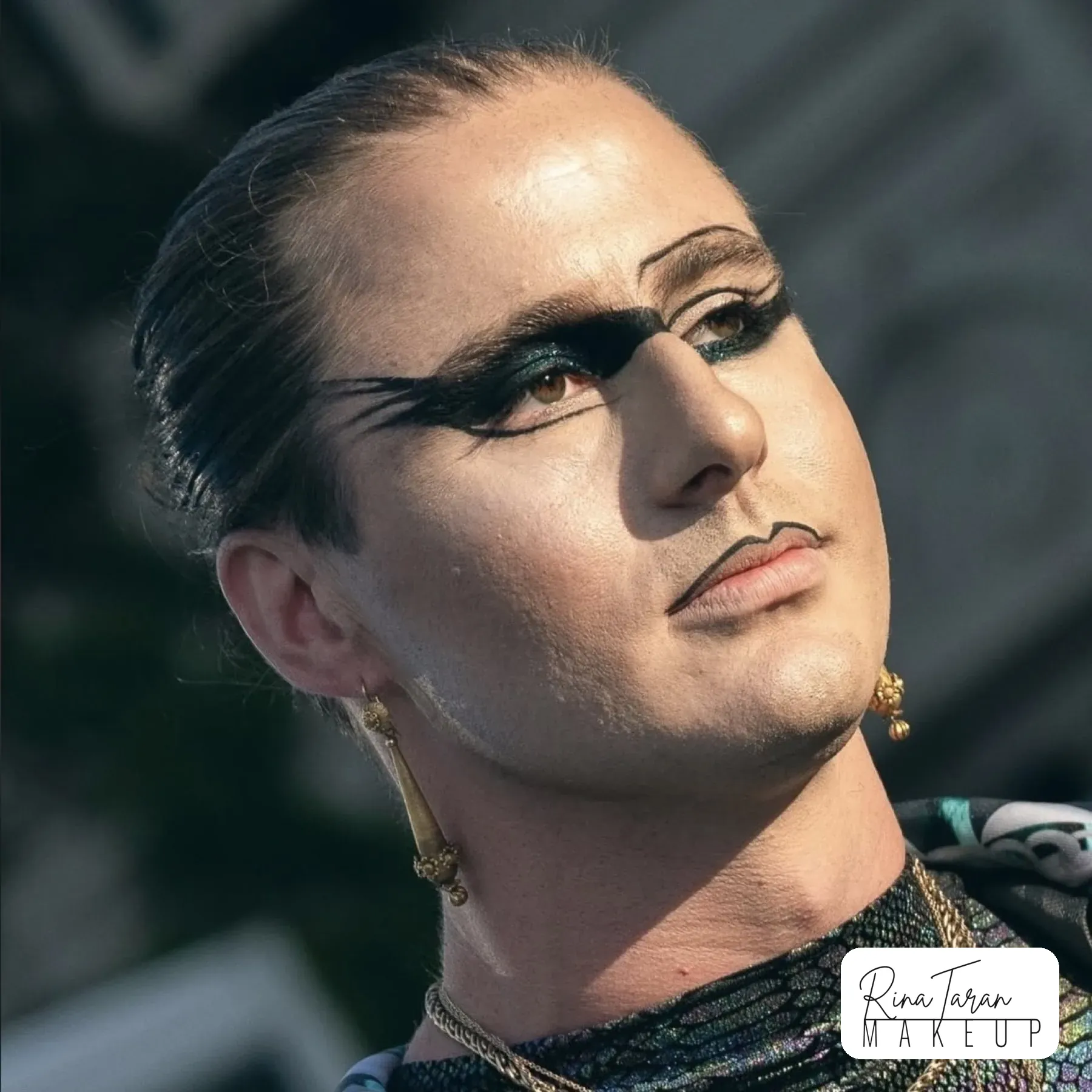 Graphic black liner shot in daylight on a festival shoot