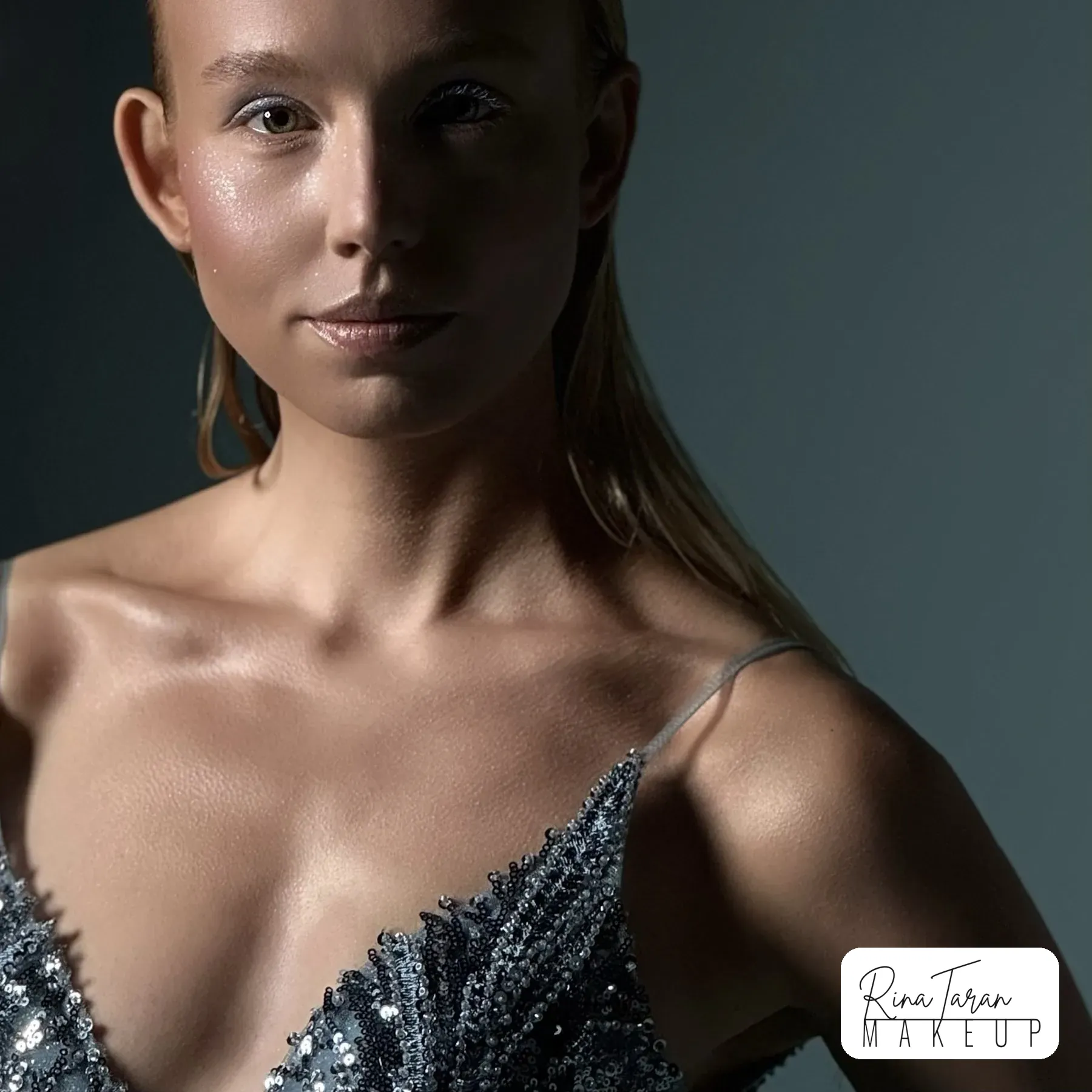 Glossy skin editorial with almost no colour and wet look hair