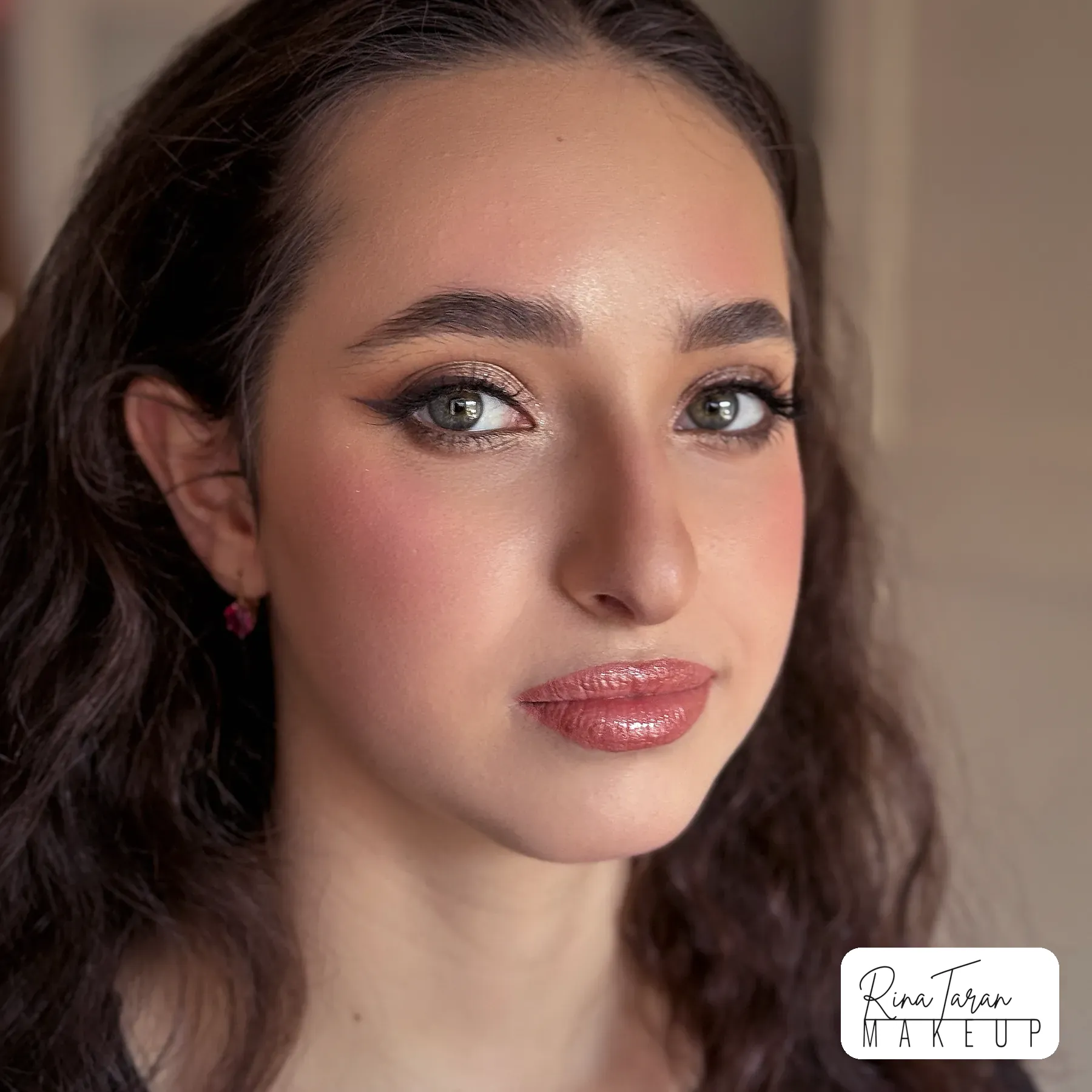 Formal makeup that photographs as skin, with a glossy nude lip
