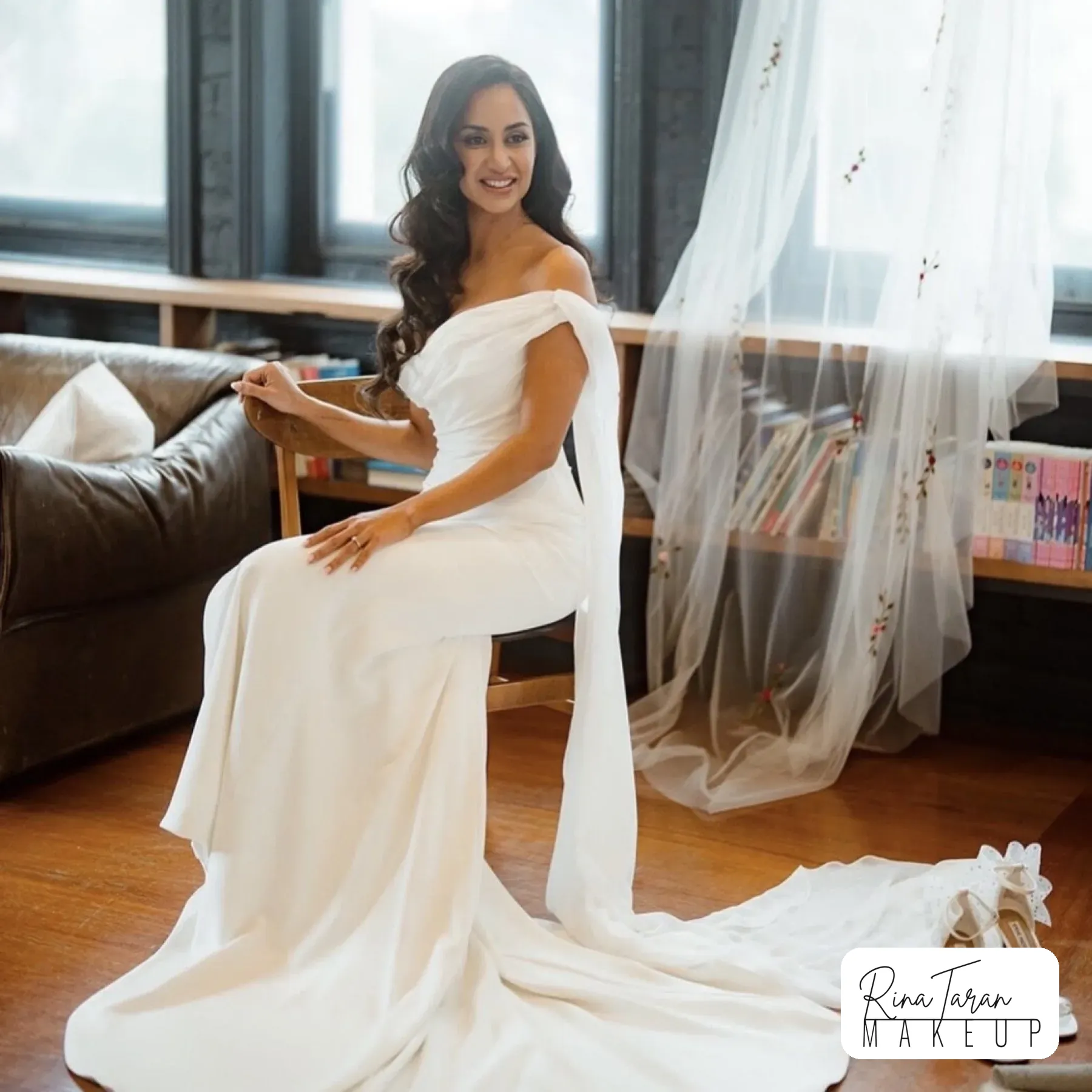 Bridal hair styling in Melbourne, waves swept over one shoulder before the ceremony