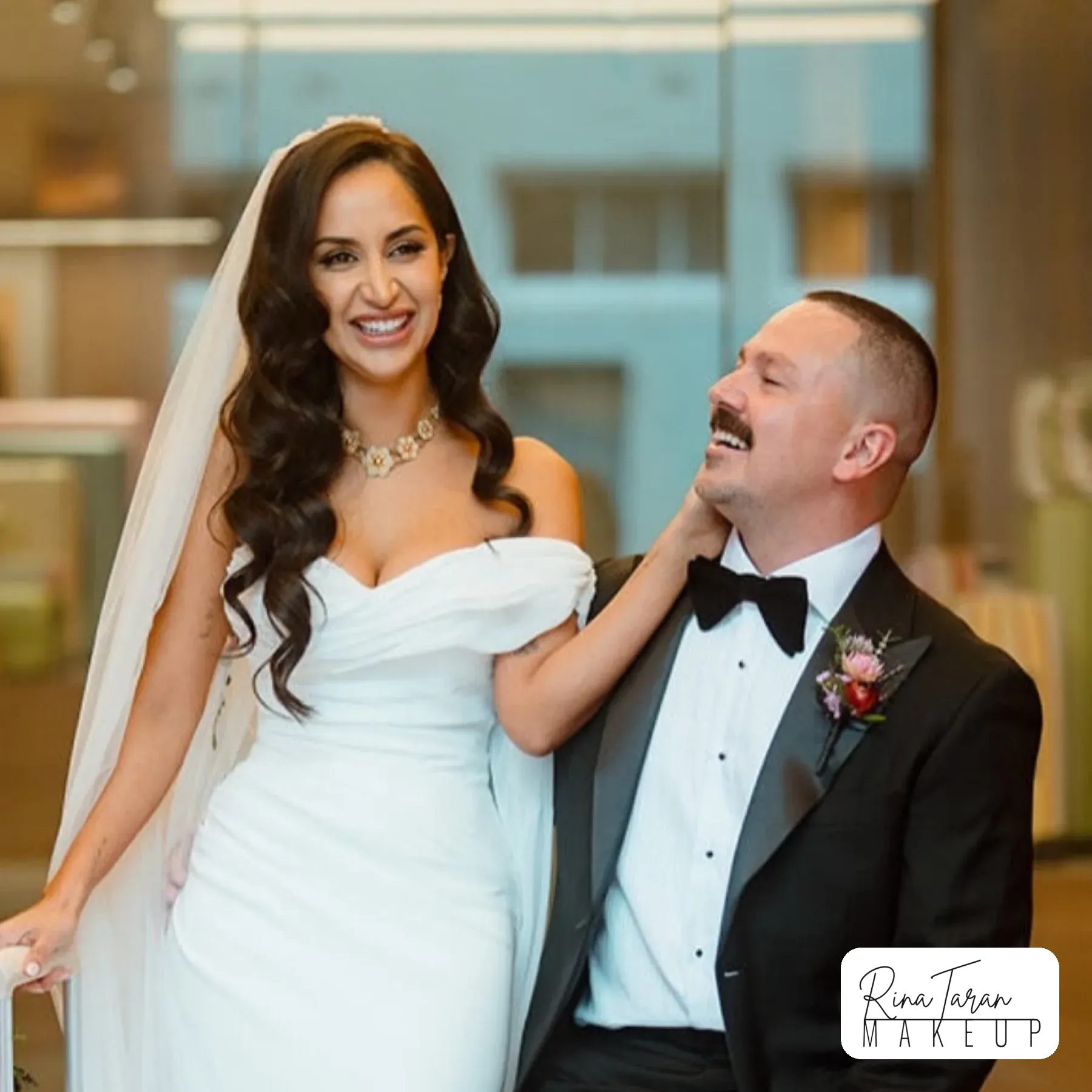 Wedding hair for a bride in a veil, undone waves that hold to the end of the day