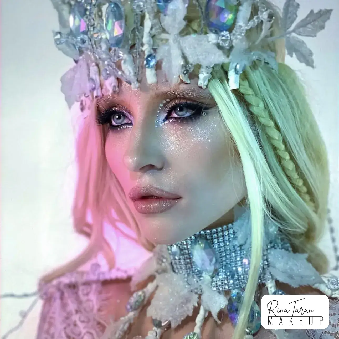 Elsa style ice queen makeup with a crystal crown, lilac lids and frosted skin