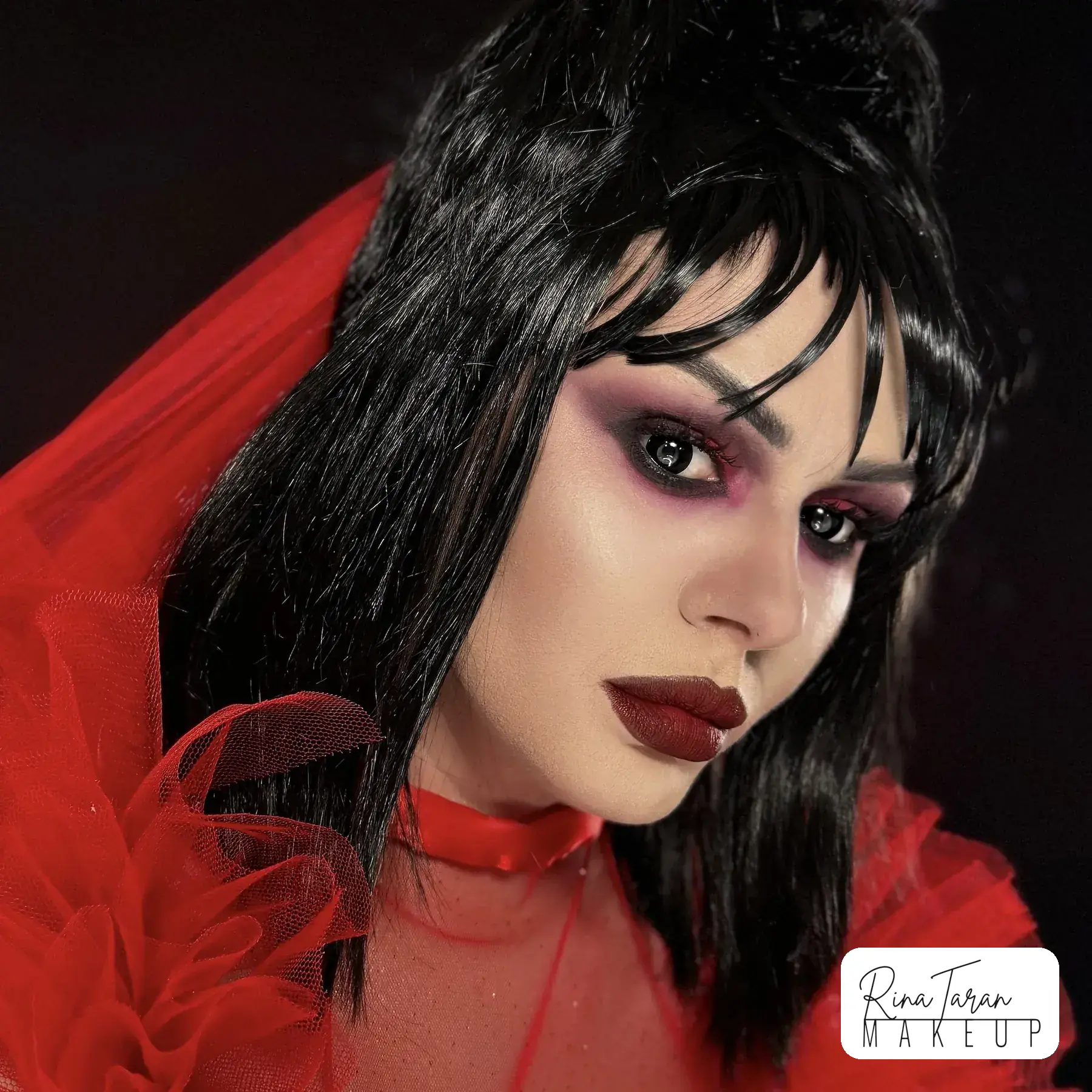 Beetlejuice bride makeup with a smoked plum eye and a deep matte lip
