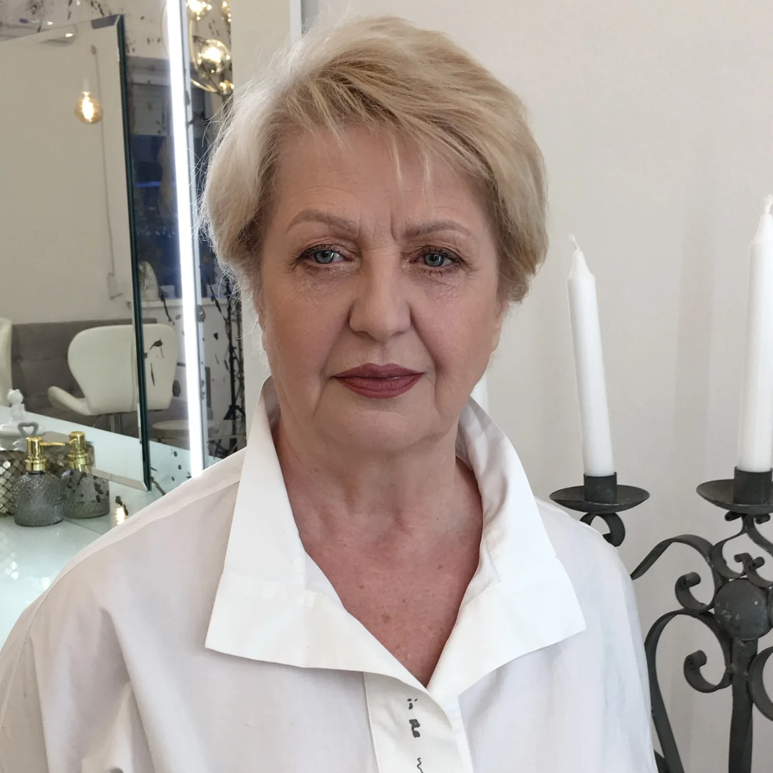 Quiet everyday makeup with a plum lip and softly defined brows