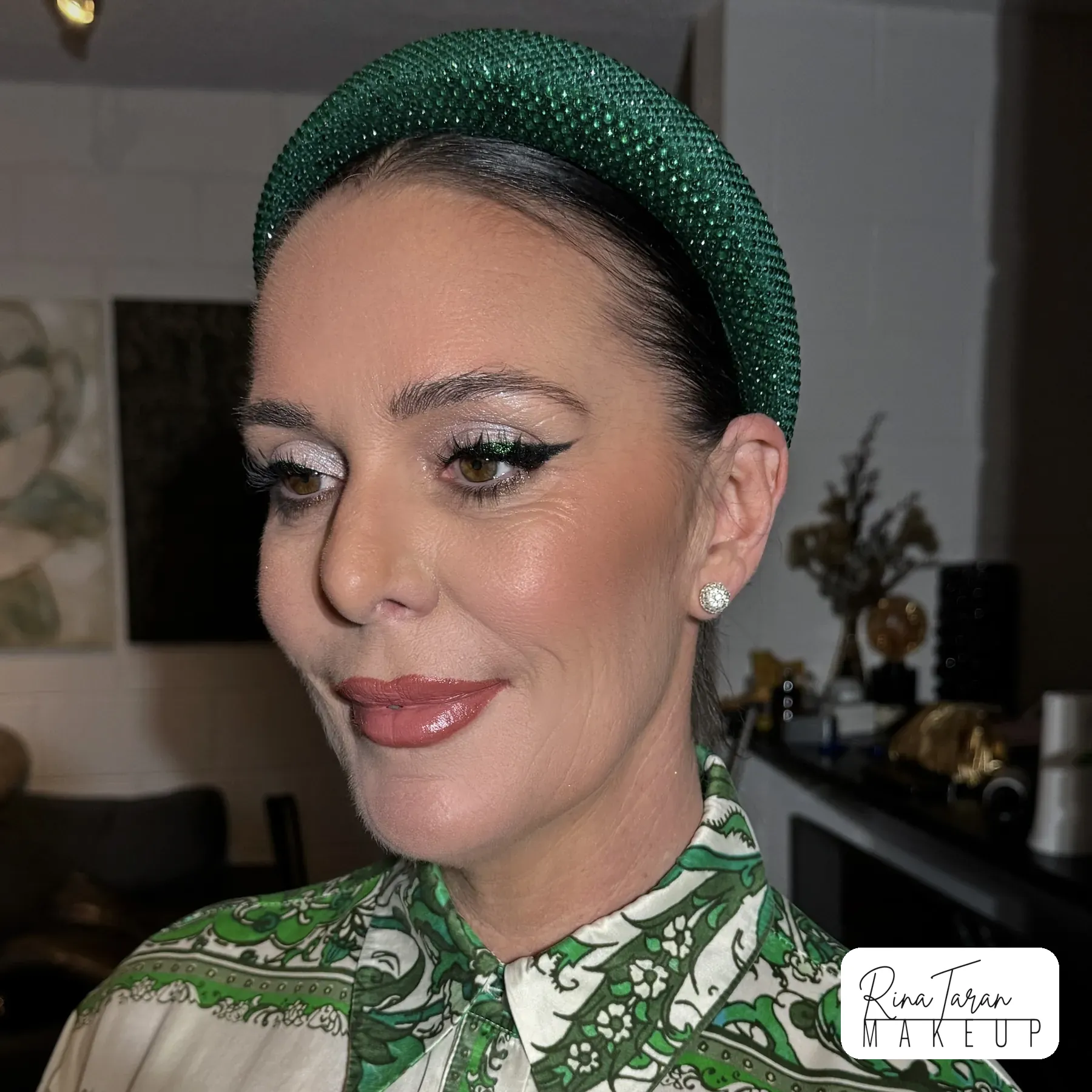 Race day makeup kept fresh and light, with a fine silver liner and a soft pink lip