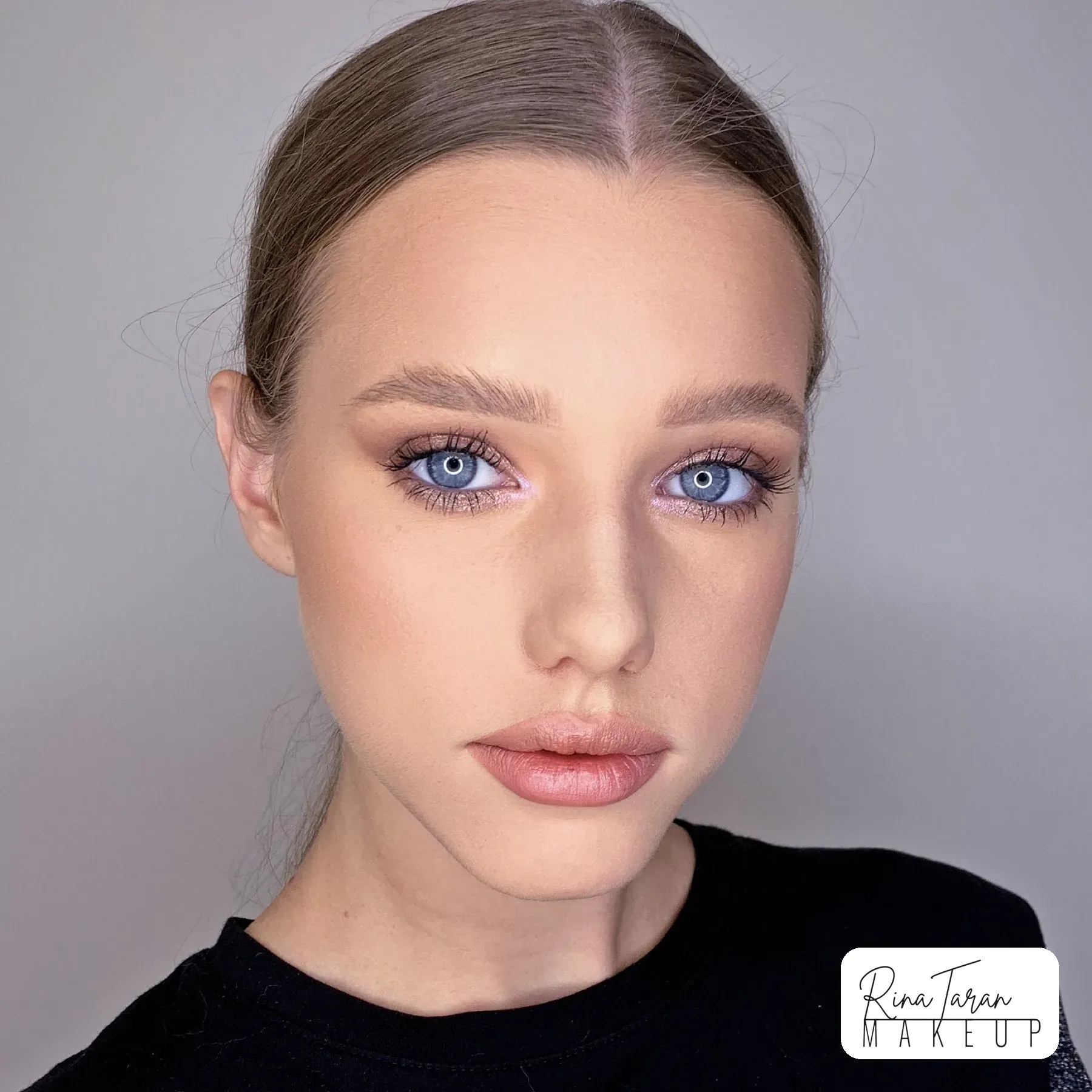 Soft formal makeup with rosy lids, flushed cheeks and skin left fresh rather than matte