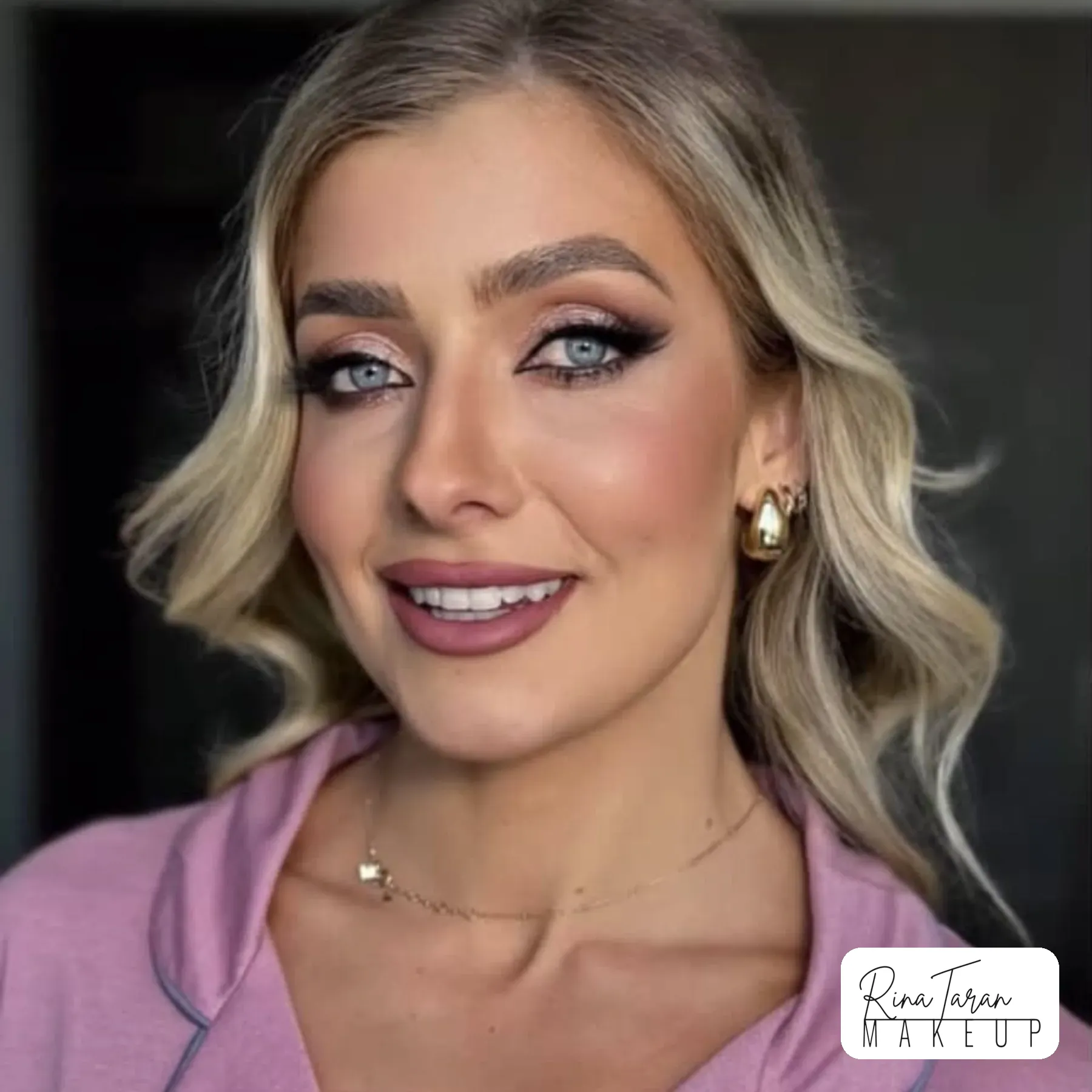 Pink shimmer eye with a black wing and a mauve lip