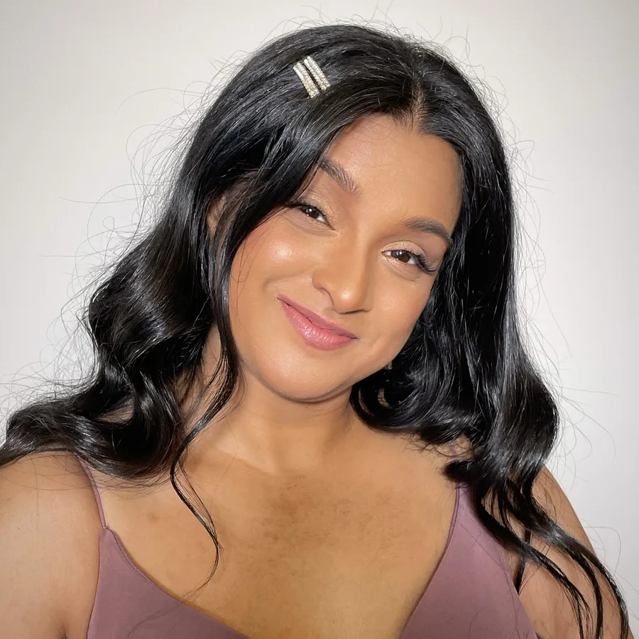 Soft neutral makeup matched to a deep skin tone, South Asian client in Melbourne