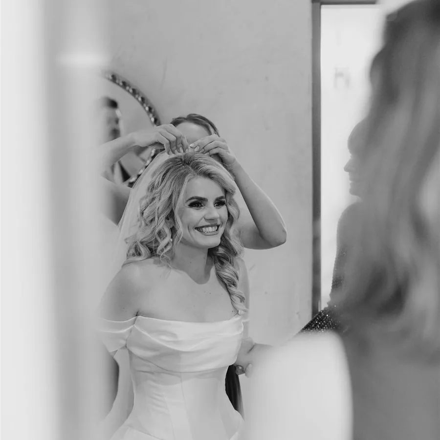 Wedding makeup as the veil goes on, photographed on the morning at a Yarra Valley estate